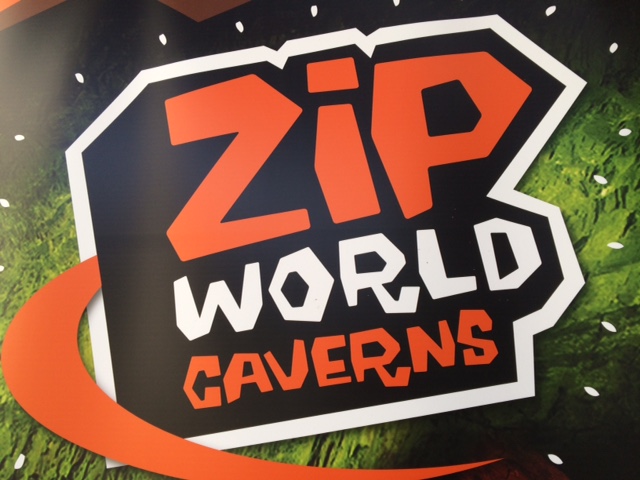 Zip World Caverns Sign